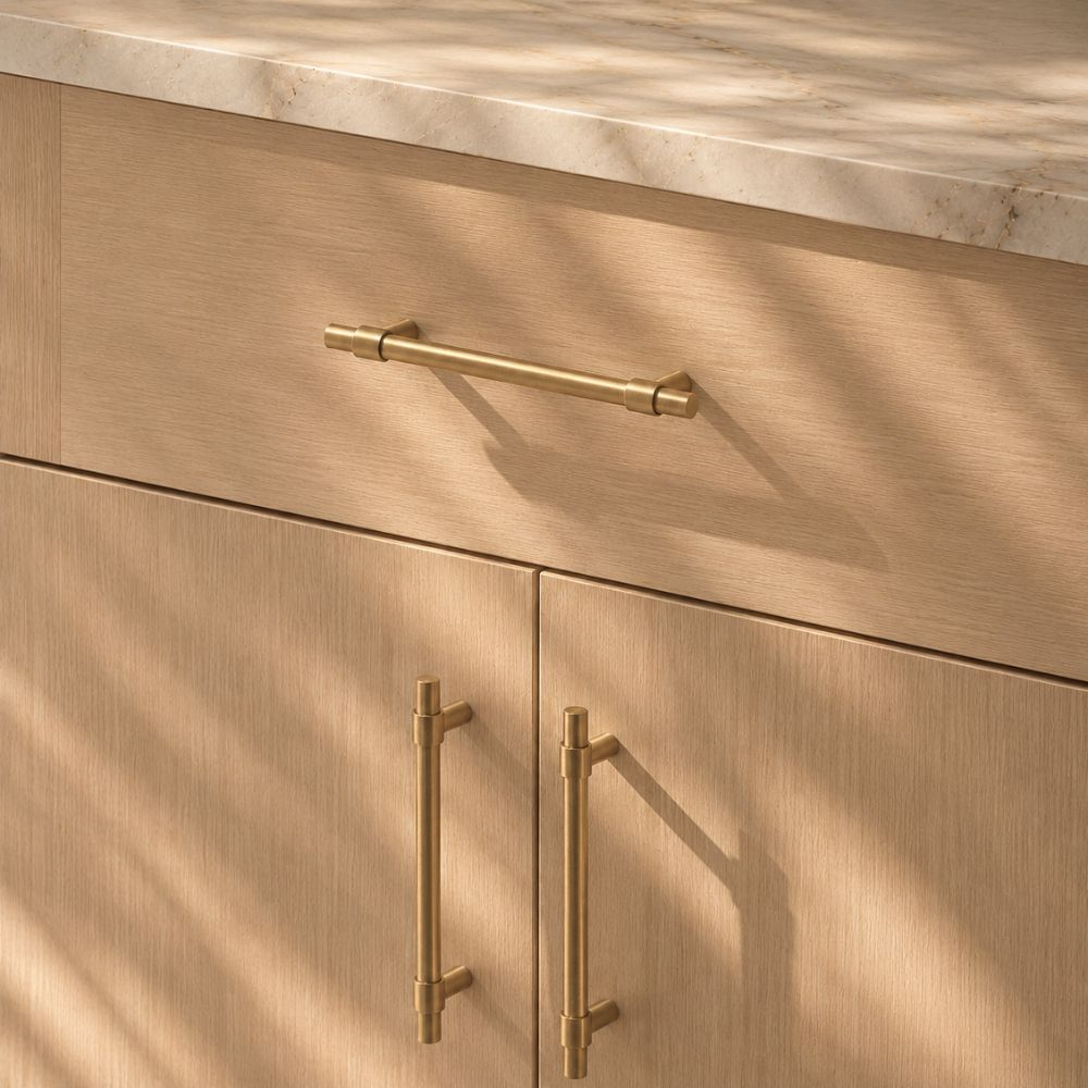 Architectural cabinet hardware in brushed brass