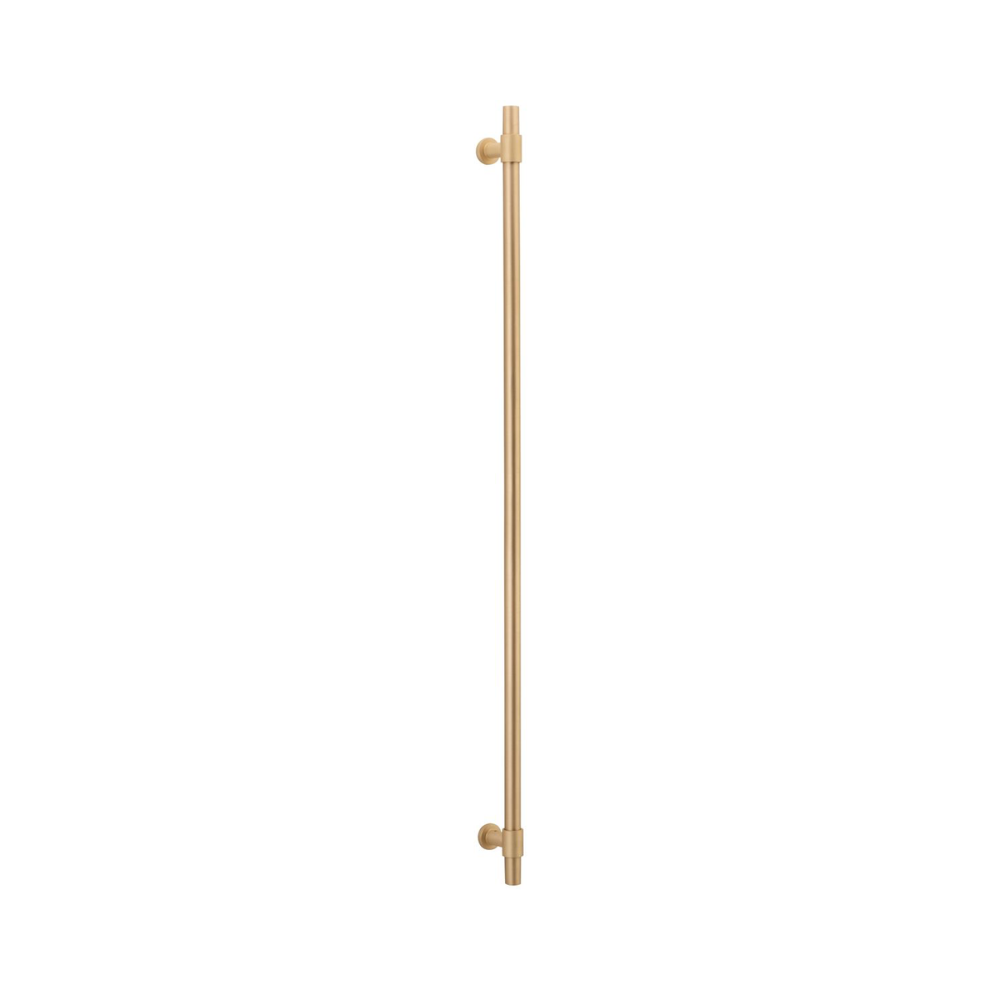 Warm brushed brass appliance handle for coastal and contemporary interiors